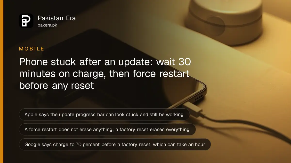 A smartphone with a dark screen on a bedside table, plugged into a charging cable beside a small power bank in warm lamp light