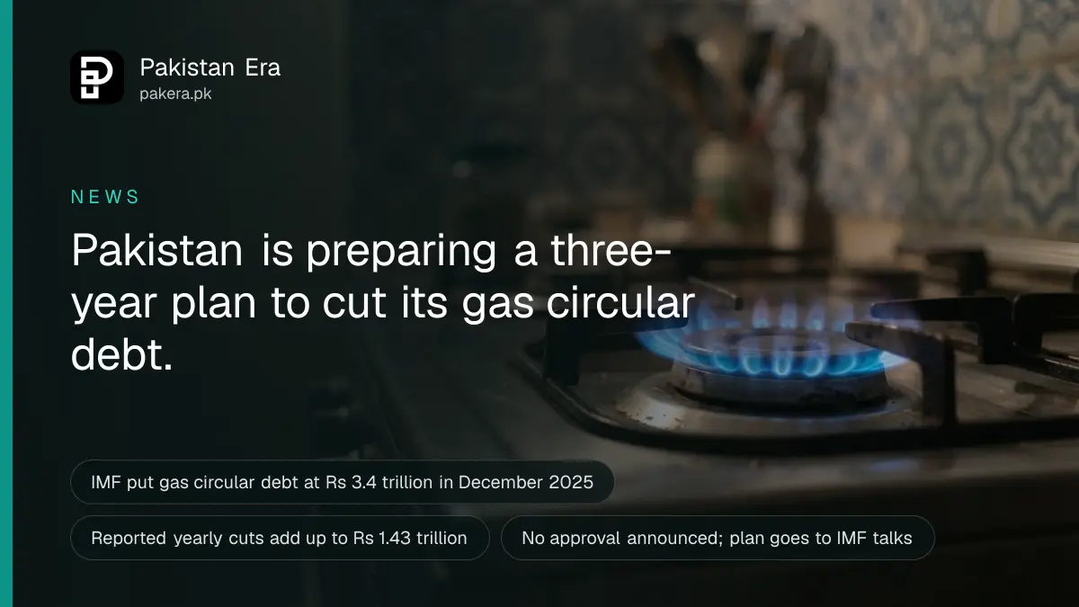 Close-up of a blue gas flame burning on a kitchen stove