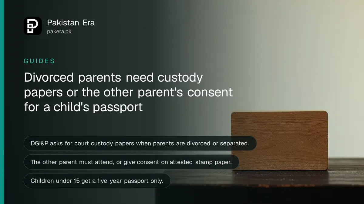 A wooden block on a dark wooden table, for a guide to a child's passport when parents are divorced