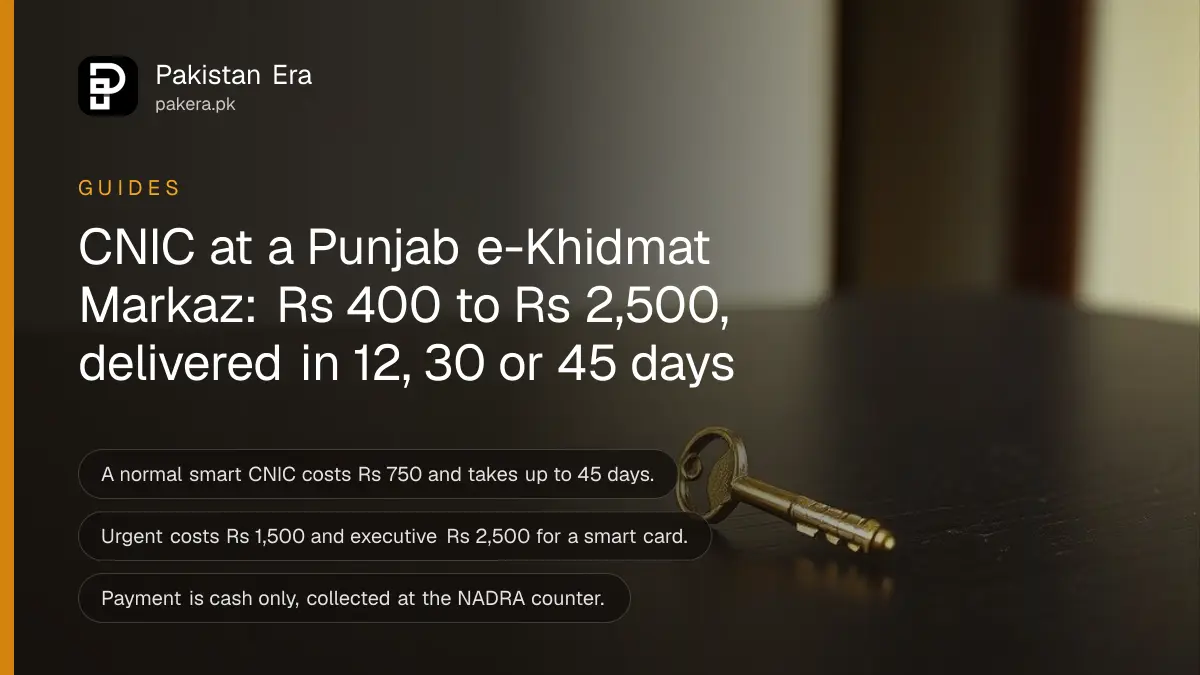 A small brass key on a dark wooden table, for a guide to getting a CNIC at a Punjab e-Khidmat Markaz