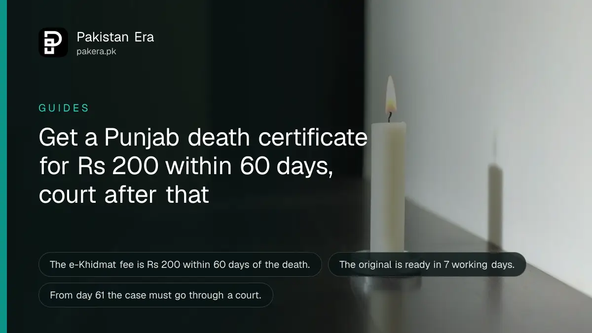 A single white candle on a dark wooden table, for a guide to a death certificate in Punjab