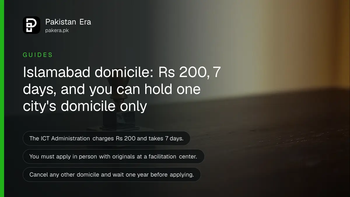 A brass stamp and ink pad on a dark wooden table, for a guide to the Islamabad domicile certificate