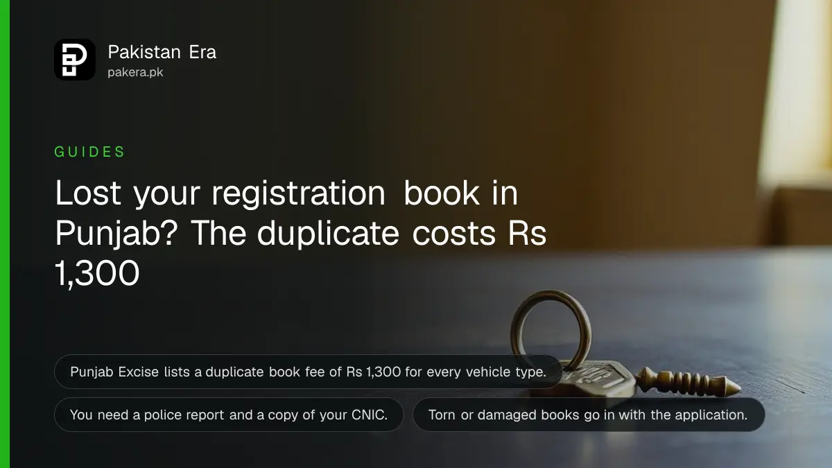 A brass key on a dark wooden table, for a guide to getting a duplicate vehicle registration book in Punjab