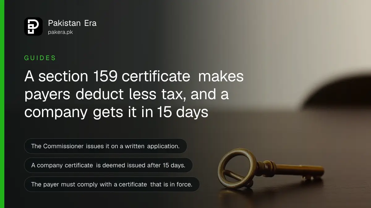 A brass key on a dark wooden table, for an article on FBR exemption and lower rate certificates