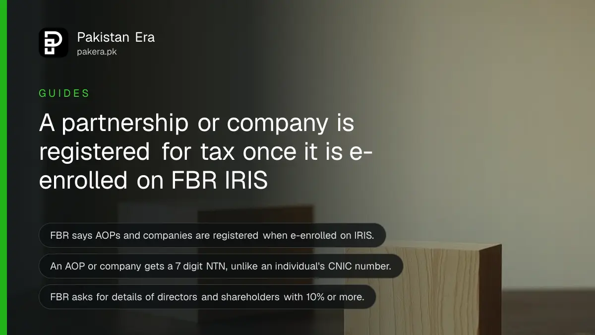 A smooth wooden block on a dark wooden table, for a guide to registering a partnership or company for an NTN in Pakistan