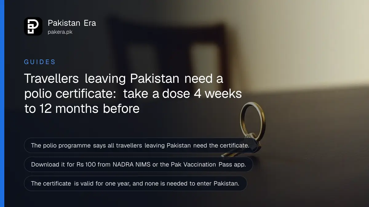 A small brass key on a dark wooden table, for a guide to the polio vaccination certificate needed to travel from Pakistan