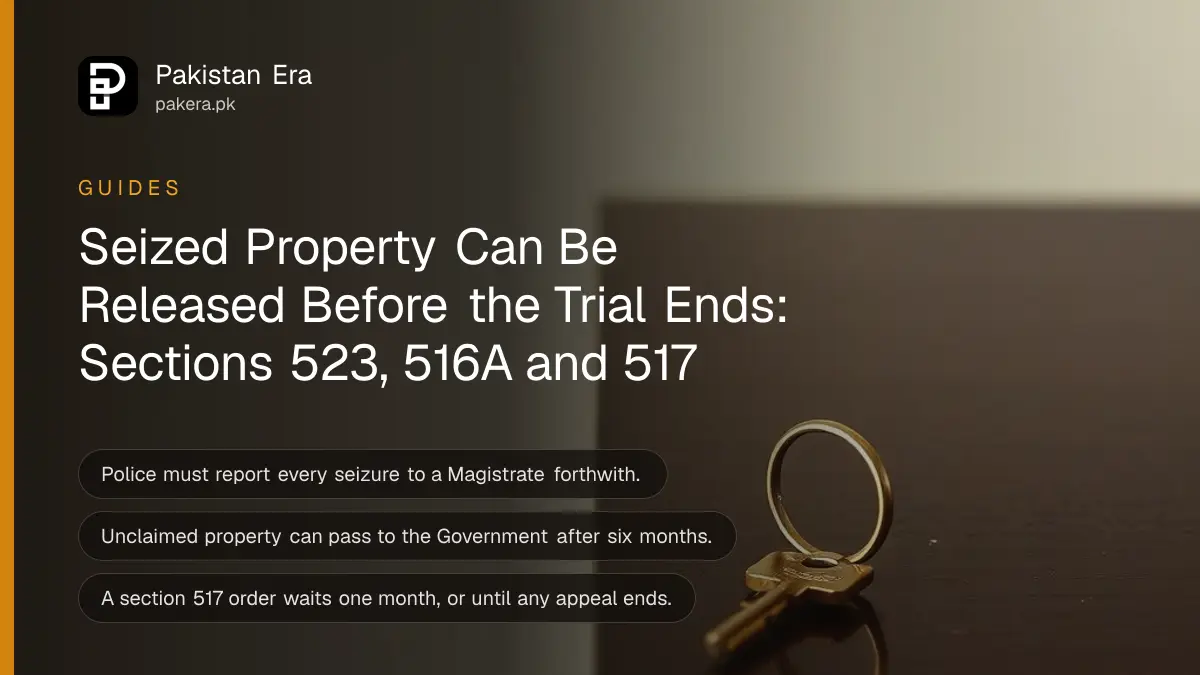 A brass key on a dark wooden table, for getting seized property back in Pakistan