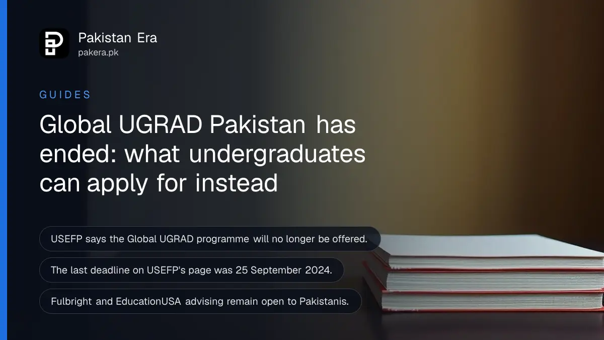 A stack of plain books on a dark wooden table, for an article on the end of Global UGRAD in Pakistan