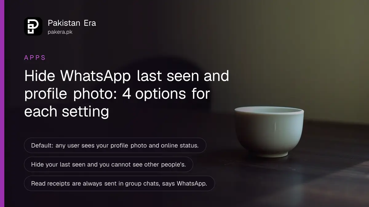 A plain ceramic cup on a dark wooden table against a cream wall, for an article on WhatsApp privacy settings