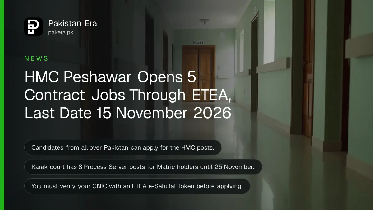 An empty hospital corridor with pale green walls and closed doors