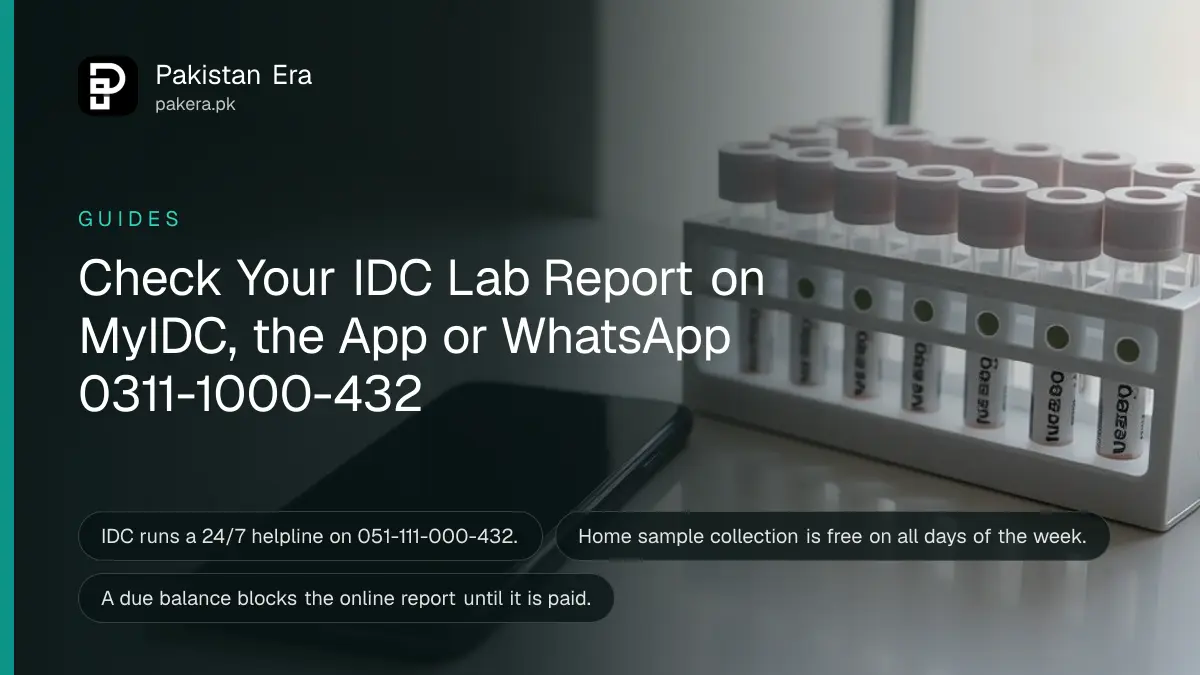 A smartphone lying face up beside a white rack of capped blood sample tubes on a clean laboratory counter