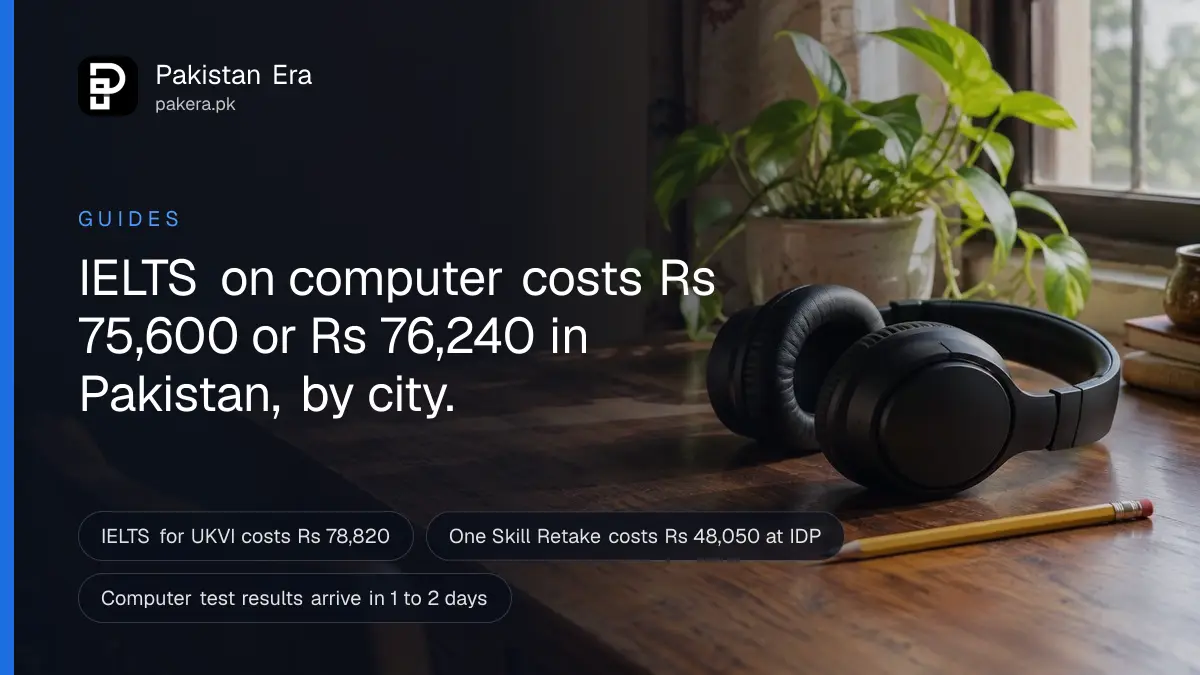 A pair of headphones and a pencil on a wooden desk beside a window in soft morning light