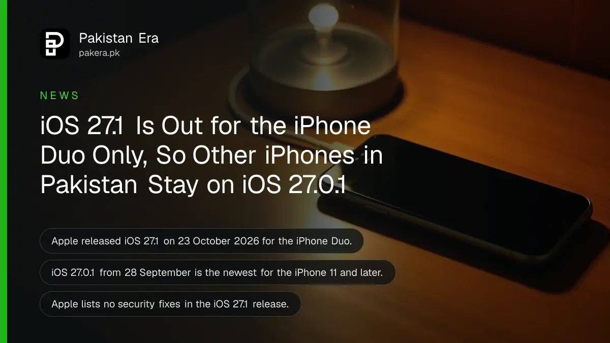 A smartphone lying face up on a bedside table with its screen dark, plugged into a white charging cable at night