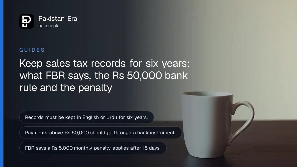A plain mug on a dark wooden table, for a guide on sales tax records fbr rules