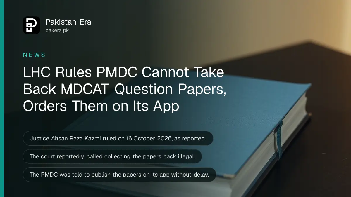 A closed plain blue book on a dark wooden table, for news of the Lahore High Court ruling on MDCAT question papers