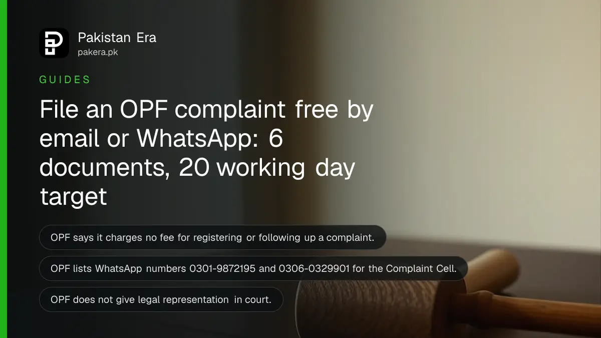 A plain wooden gavel on a dark wooden table, for an article on the OPF Complaint Cell for overseas Pakistanis
