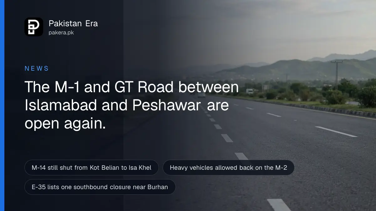 An open motorway lane in soft morning light, with light traffic blurred in the distance
