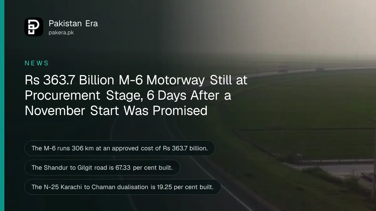 A wide empty motorway curving through flat green fields at dawn