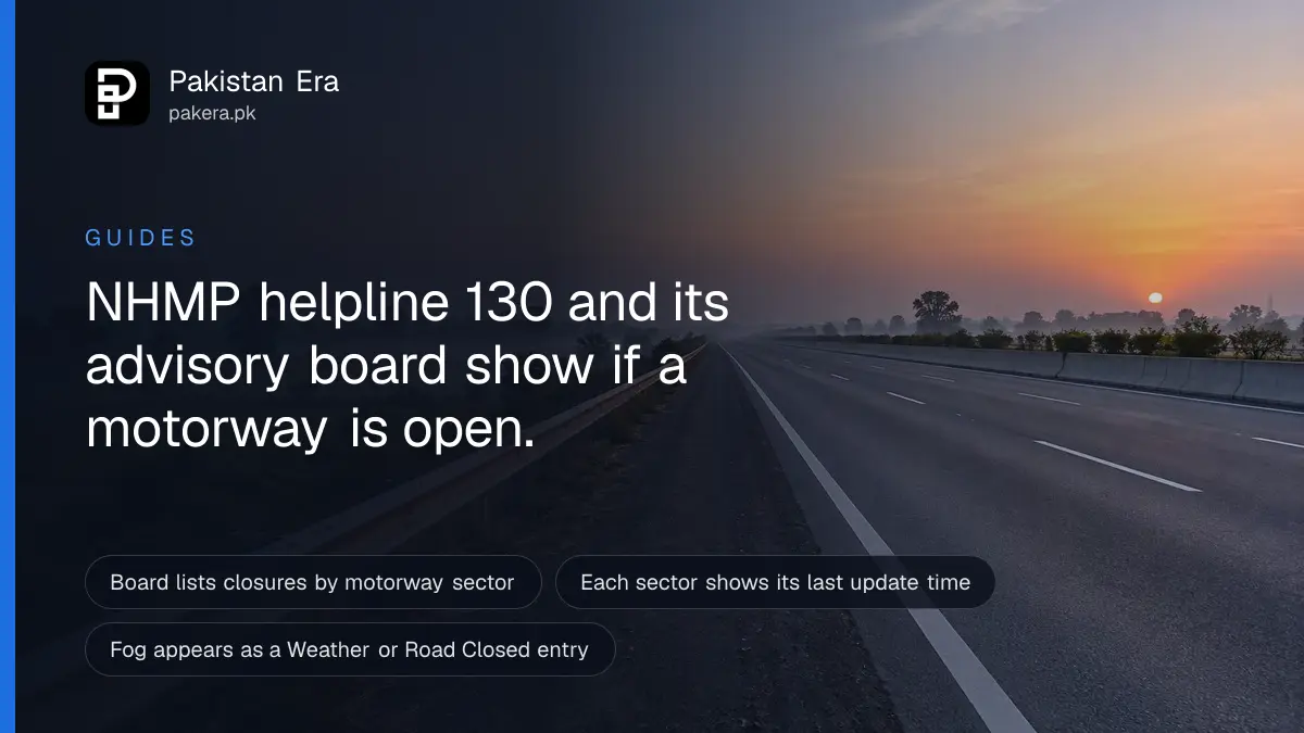 An empty motorway lane at dawn with a steel guard rail and light mist over fields in Punjab