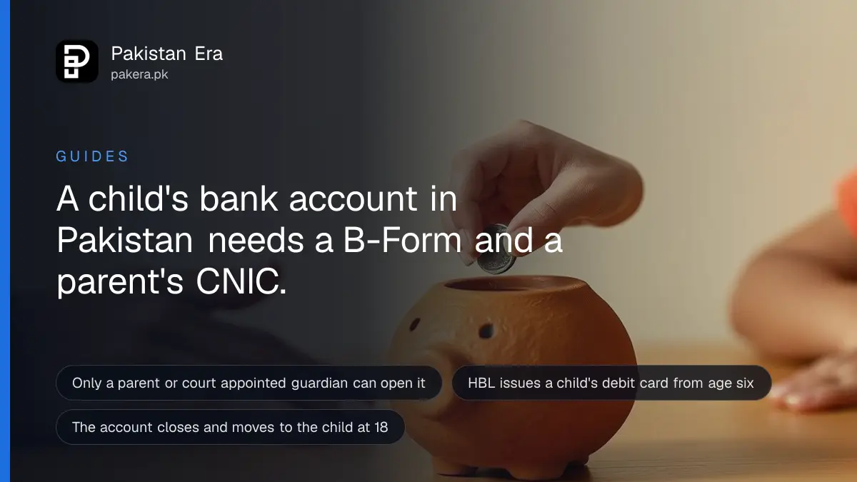 A child's small hand dropping a coin into a clay piggy bank on a wooden table, with an adult's hand beside it