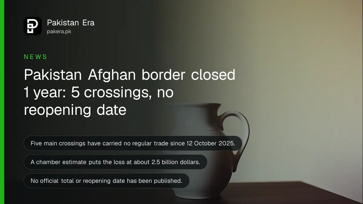 A plain ceramic jug on a dark wooden table, for an article on pakistan afghanistan border closed