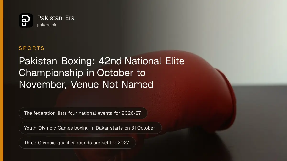 A single red boxing glove with no lettering resting on a dark wooden table in soft daylight