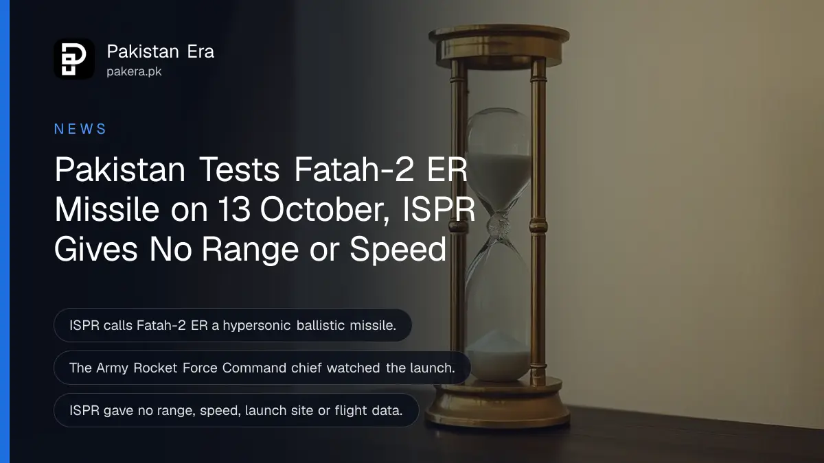 A brass hourglass on a dark wooden table, for a report on the Fatah-2 ER missile test announced by ISPR