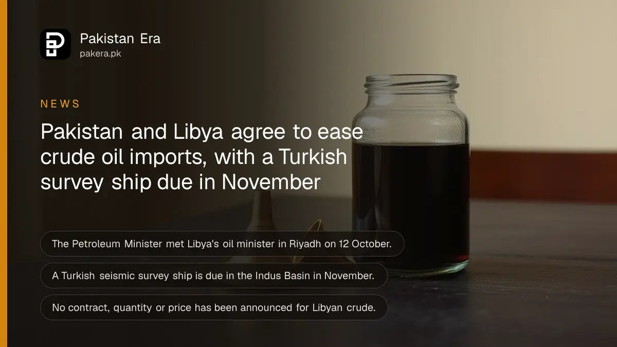 A glass jar of crude oil and a brass funnel on a dark wooden table, for a report on Pakistan and Libya agreeing to ease crude oil imports