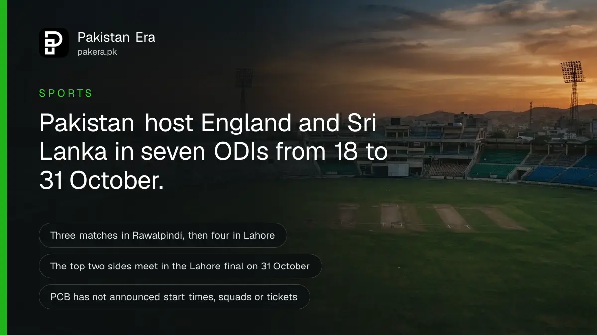 An empty cricket stadium with a green outfield and empty stands at sunset in Rawalpindi