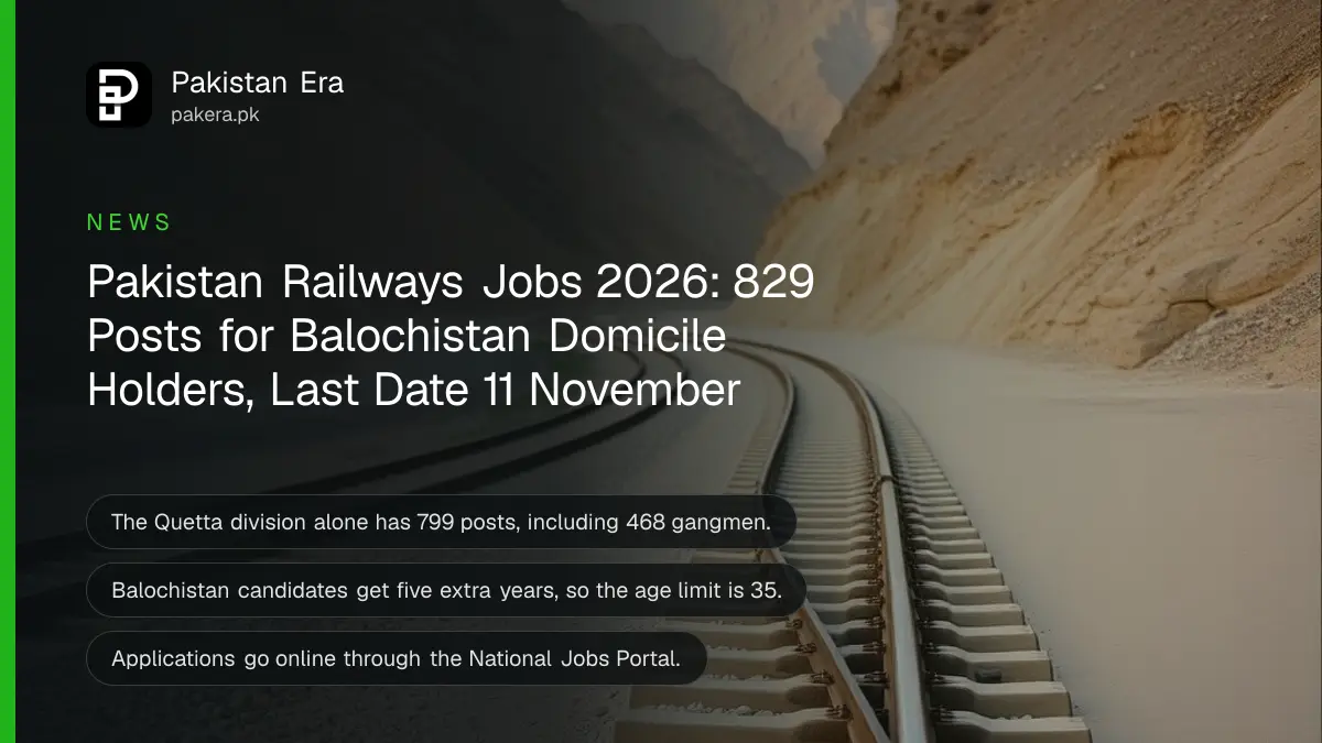 Empty railway tracks curving through a dry mountain valley in soft evening light