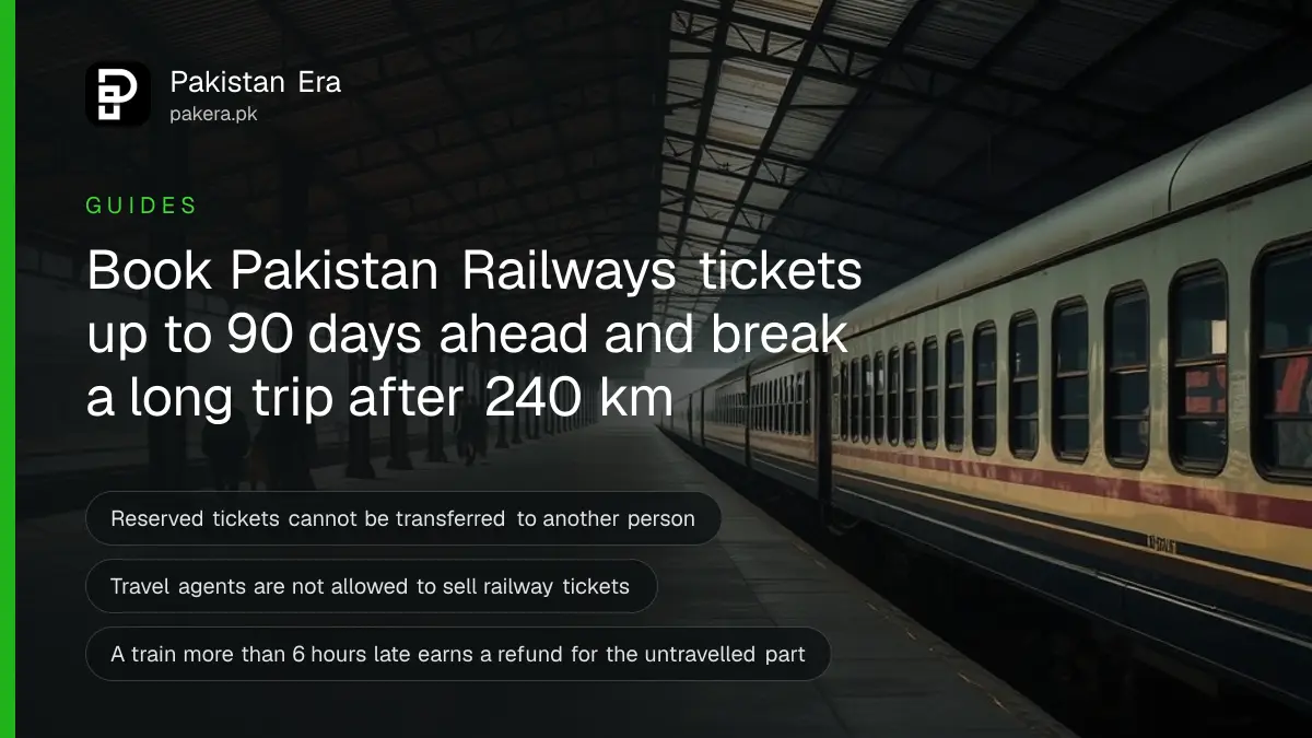 A long empty railway platform under an old iron roof at Lahore railway station in soft morning light