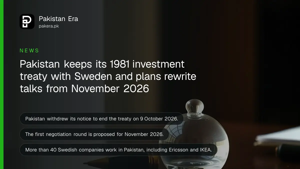 A glass paperweight and a brass fountain pen on a dark walnut desk in soft morning light, for Pakistan and Sweden's investment treaty talks