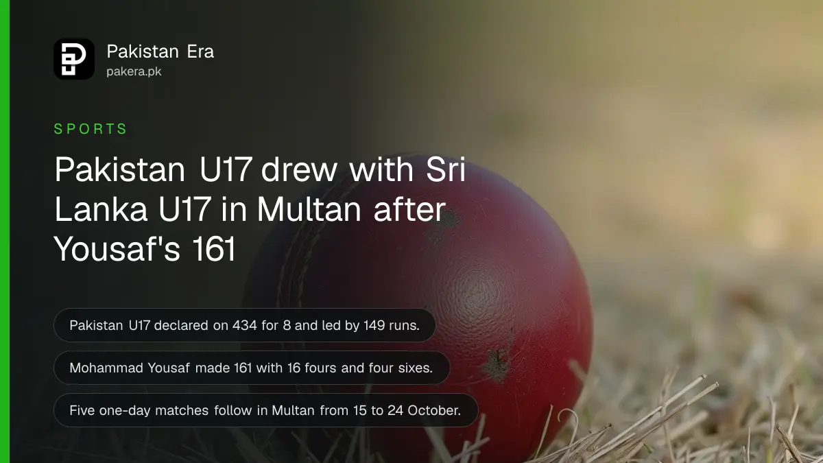 A worn red leather cricket ball resting on dry grass in warm afternoon light, for the Pakistan U17 v Sri Lanka U17 match in Multan