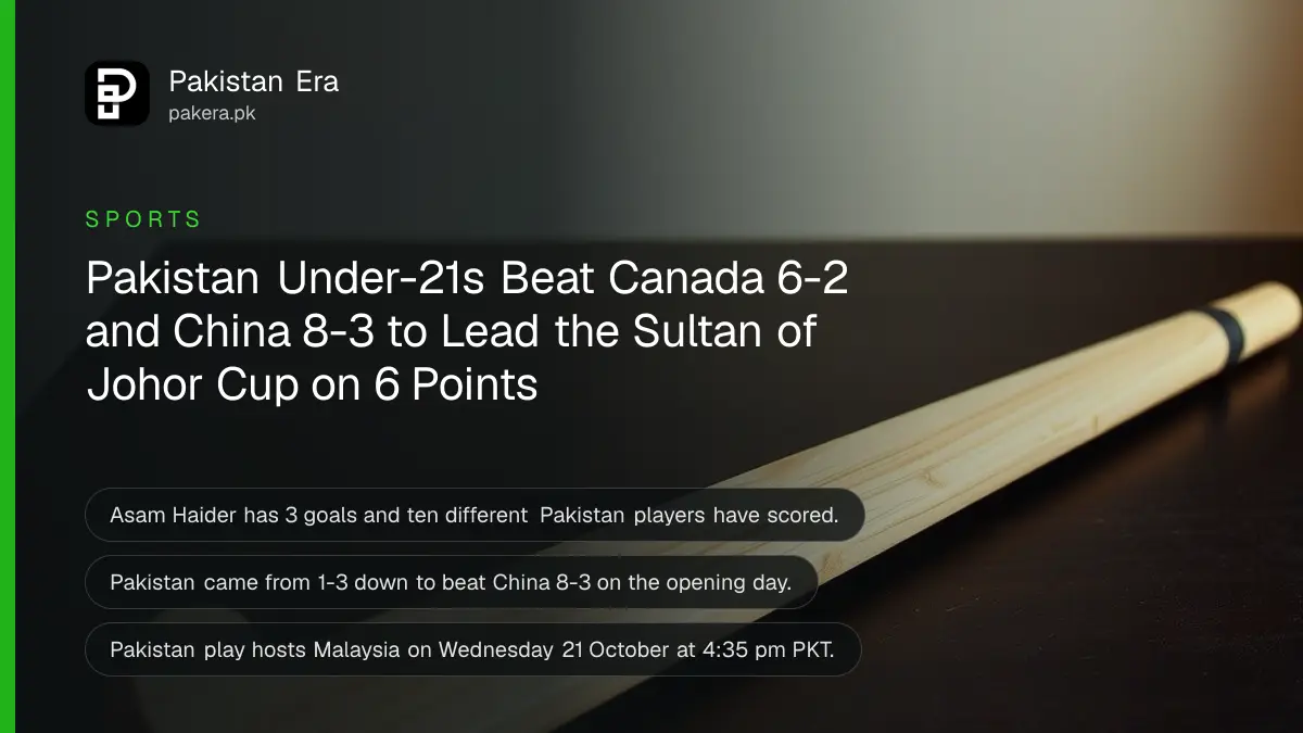 A plain wooden field hockey stick on a dark wooden table, for Pakistan's under-21 wins at the Sultan of Johor Cup