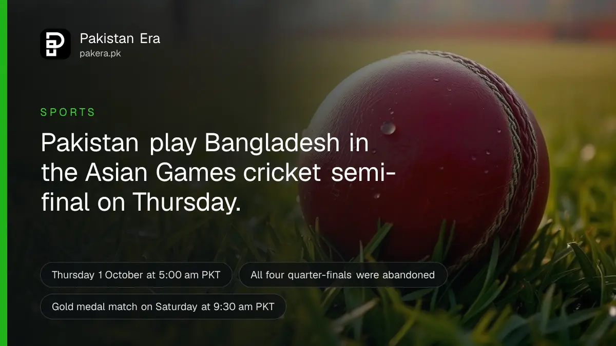 A red cricket ball resting on green outfield grass at dawn, with soft golden light and dew on the grass