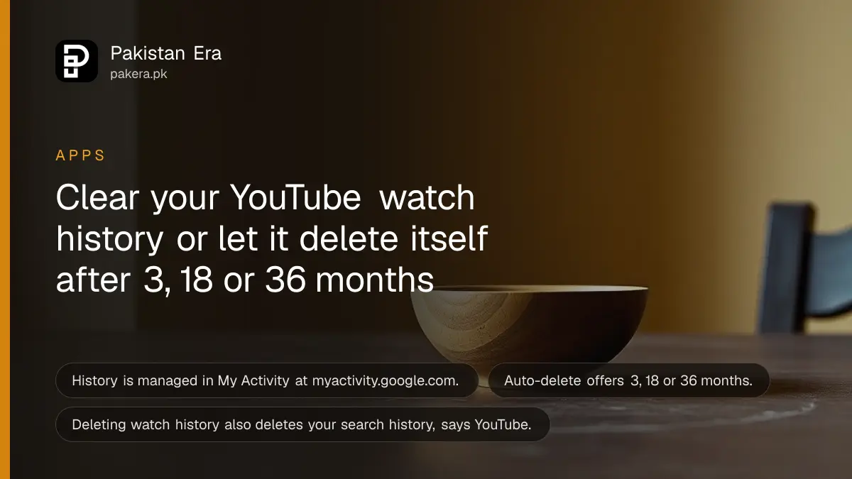 A plain wooden bowl on a dark wooden table against a cream wall, for an article on YouTube watch history