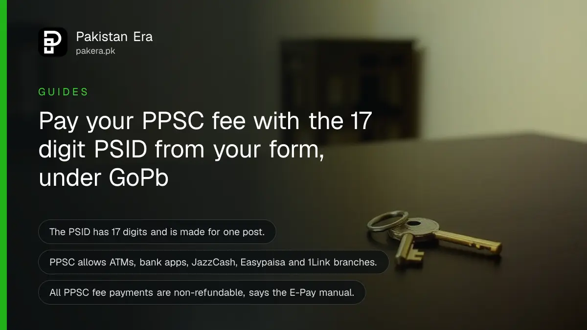 A single brass key on a dark wooden table, for a guide on paying a PPSC fee online in Punjab
