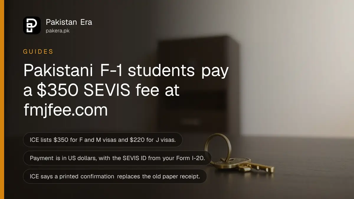 A brass key on a dark wooden table, for a guide to paying the SEVIS fee for a US student visa