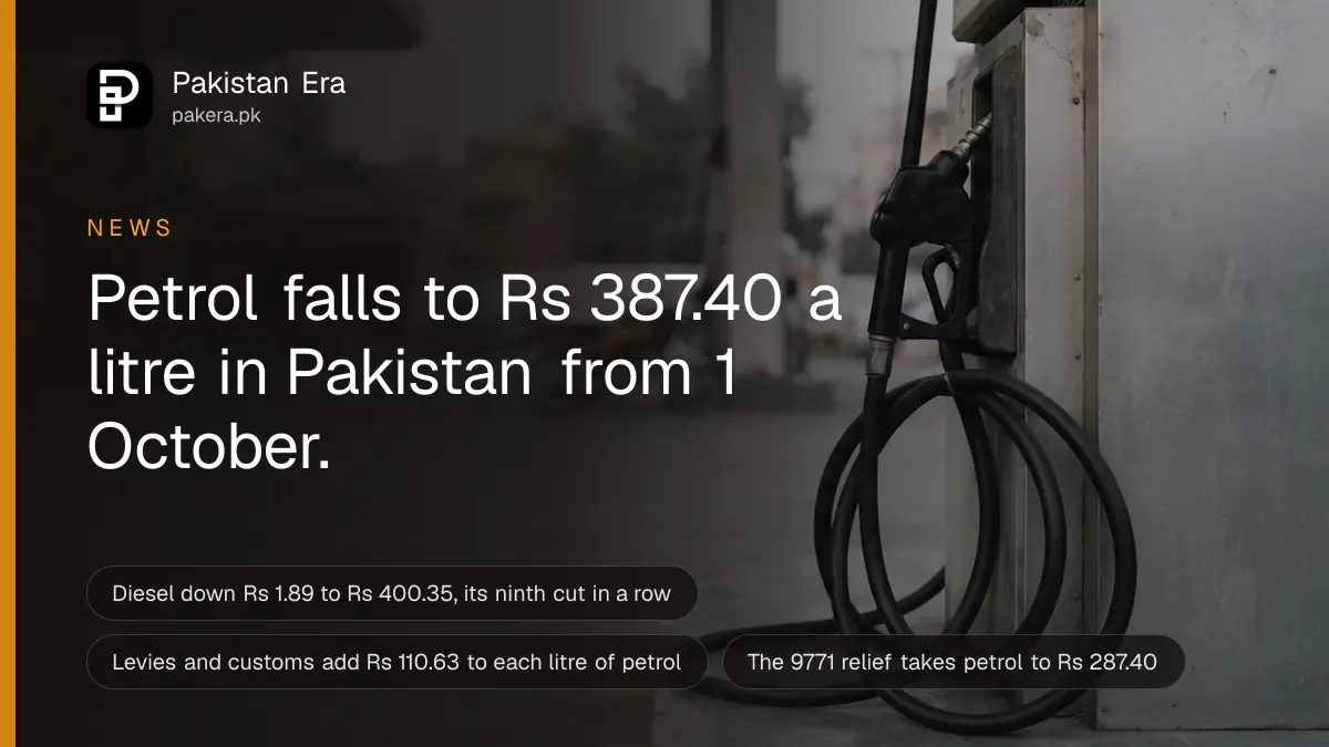 A fuel nozzle hanging in its holder on a petrol pump in Karachi in soft early morning light