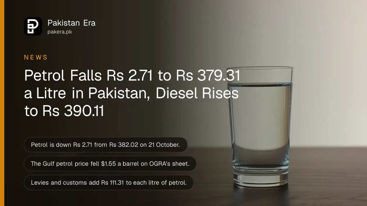 A glass of water on a dark wooden table against a plain cream wall