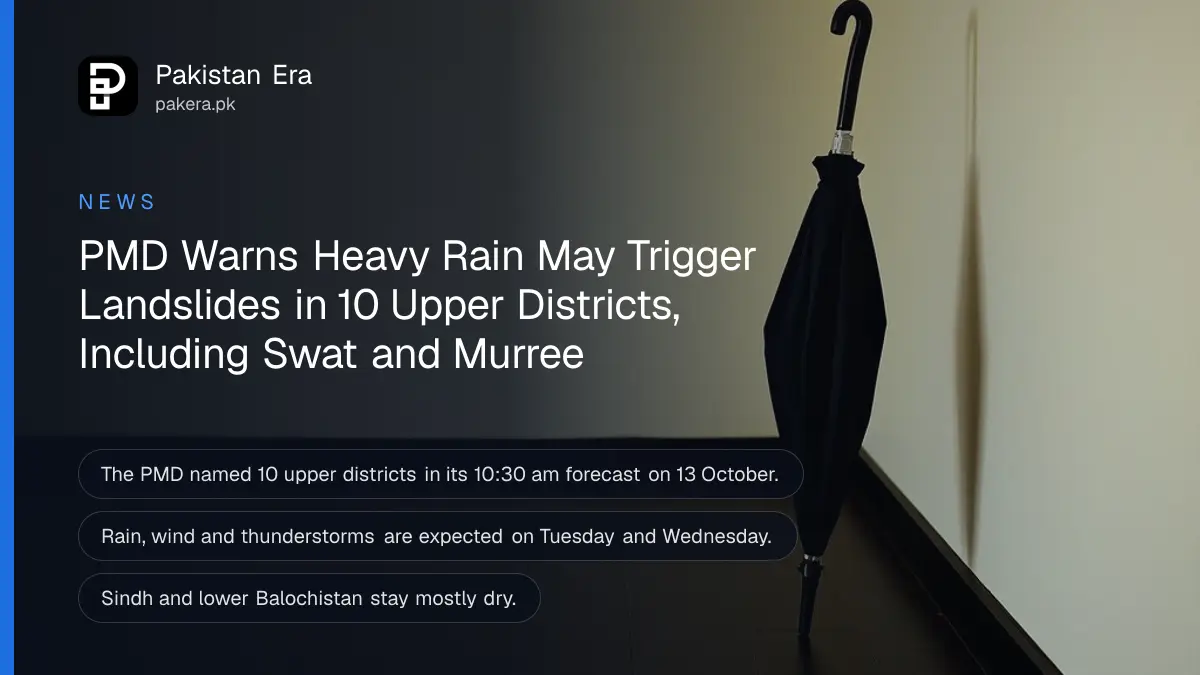 A closed black umbrella leaning on a cream wall, for a report on the PMD rain and landslide warning