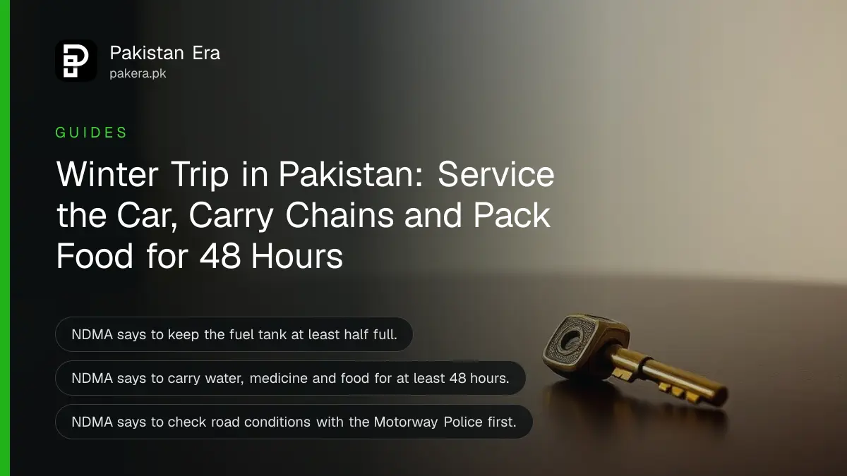 A brass key on a dark wooden table, for a guide on preparing a car for a winter trip in Pakistan