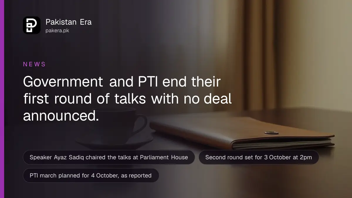 Two cups of green tea and a closed leather folder on a polished wooden table in a quiet meeting room in Islamabad
