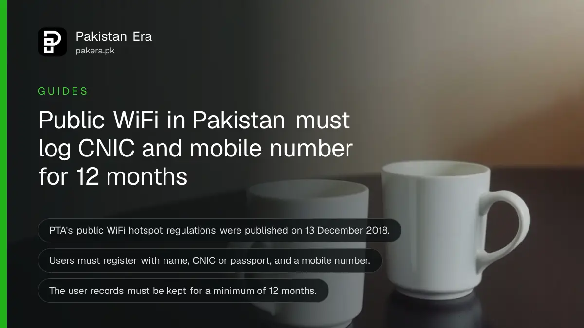 Two empty white coffee cups on a dark wooden table, for a guide on public WiFi rules for cafes in Pakistan