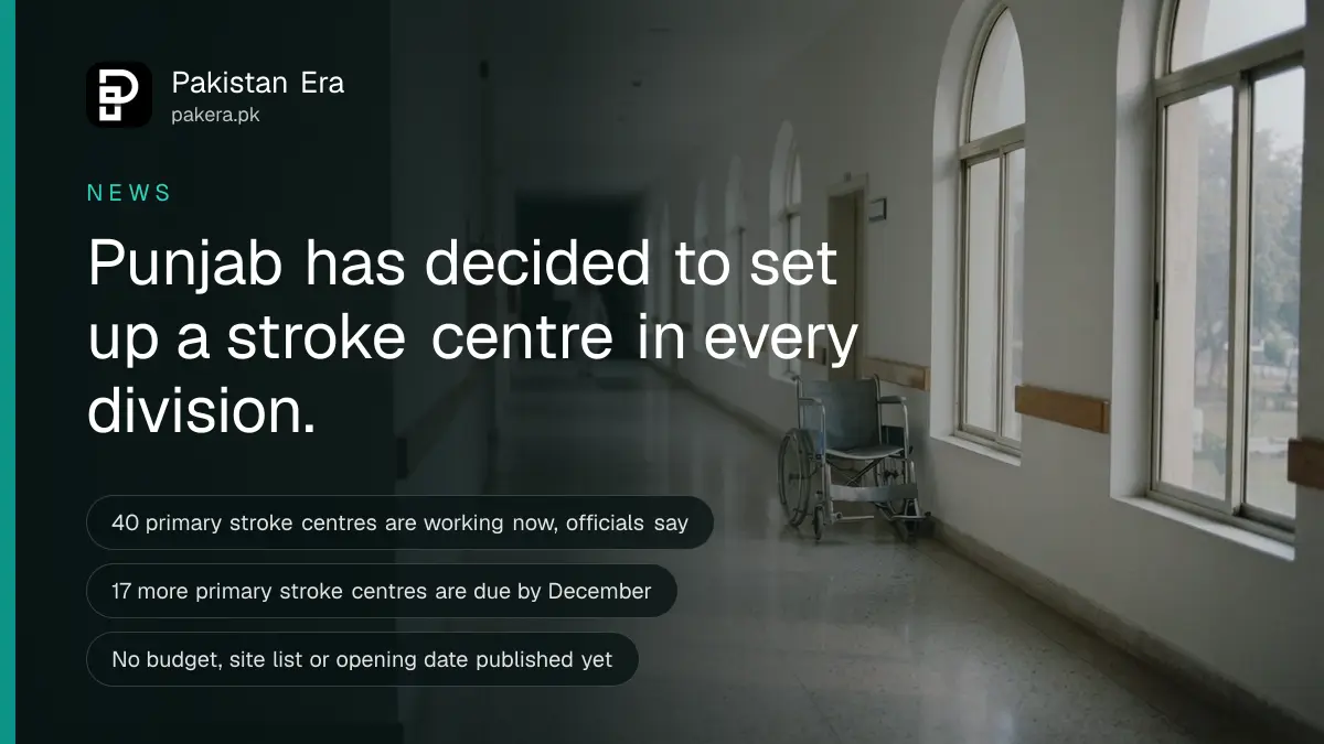An empty, clean hospital corridor with polished floors and soft daylight