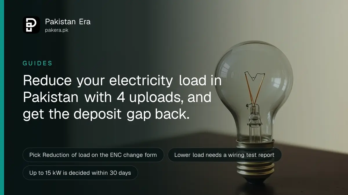 A glass light bulb on a dark wooden table, for a guide on reduce sanctioned load electricity pakistan