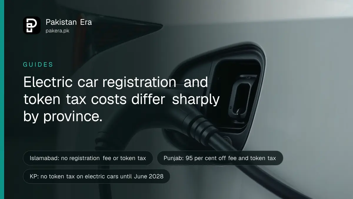 A charging cable plugged into the side charging port of a white electric car in a clean garage