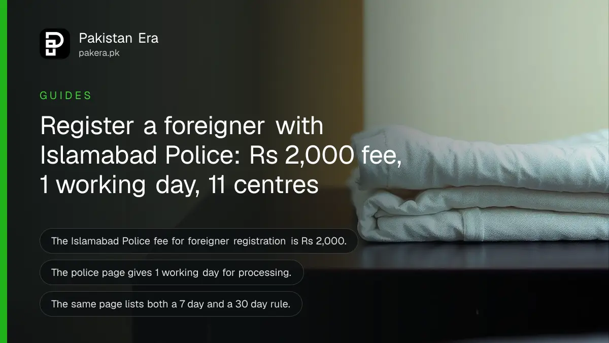 A folded white cloth on a dark wooden table, for an article on foreigner registration islamabad