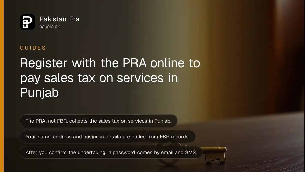 A brass key on a dark wooden table, for a guide on registering with the Punjab Revenue Authority for sales tax on services