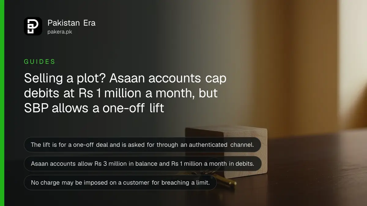 A brass key and a wooden block on a dark table, for a guide on lifting a bank account limit for a property deal in Pakistan